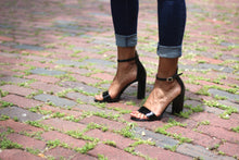 Black Saffiano Patent Leather Ankle Strap Sandal (90mm) Modeled on antique brick streets in Houston, Texas.